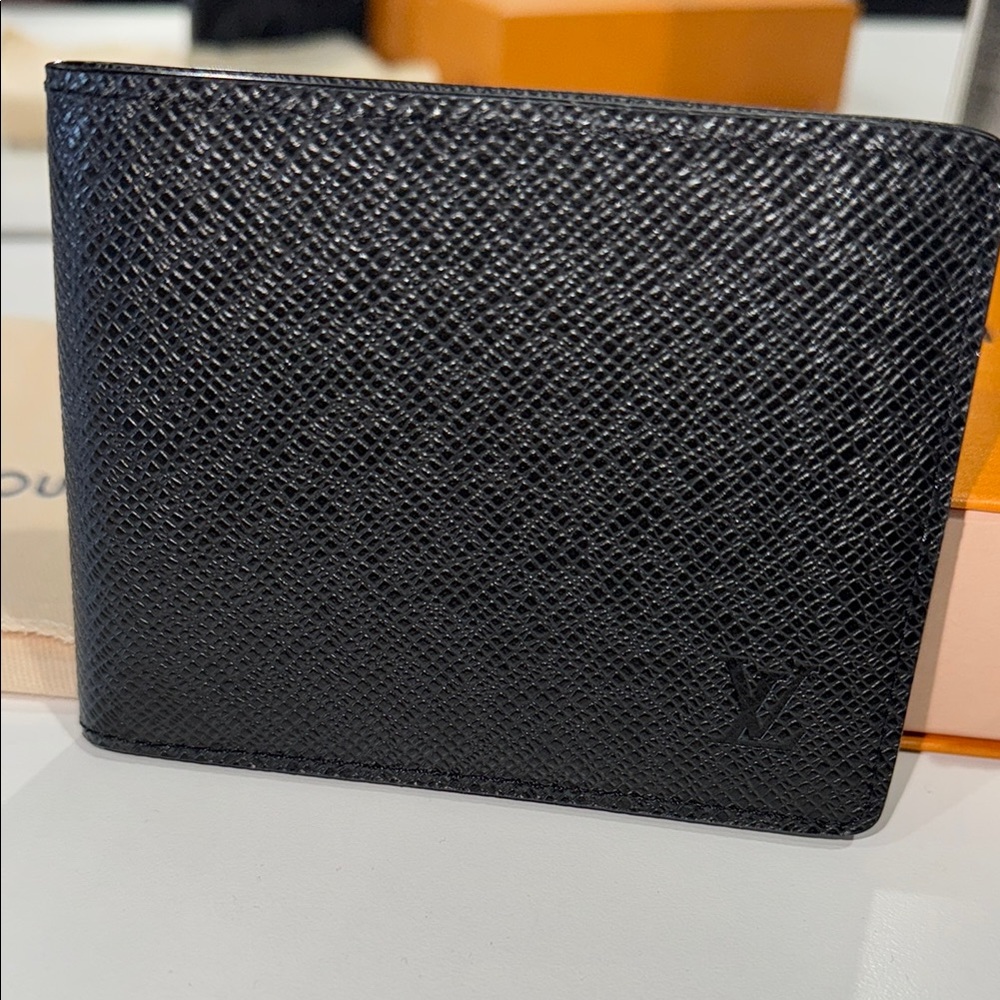 Brand new, never used Louis Vuitton Black Taiga Slim Wallet